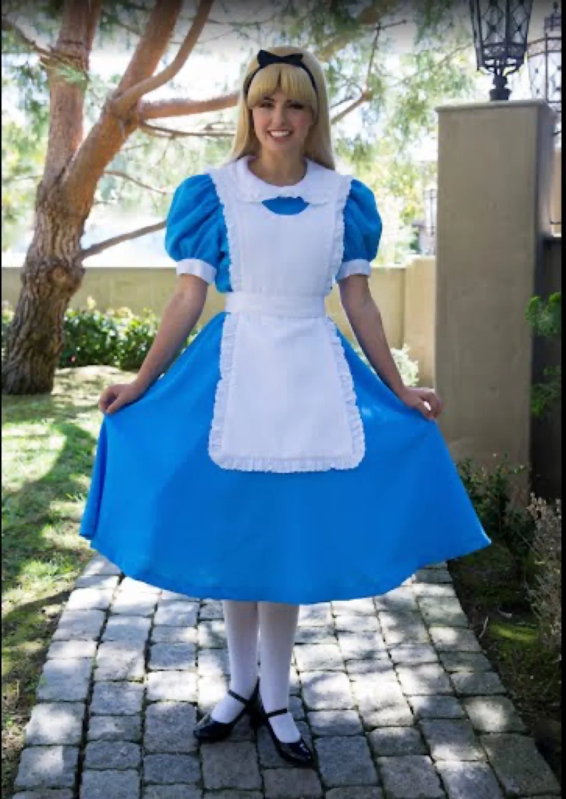 Wonderland Girl party character in Austin