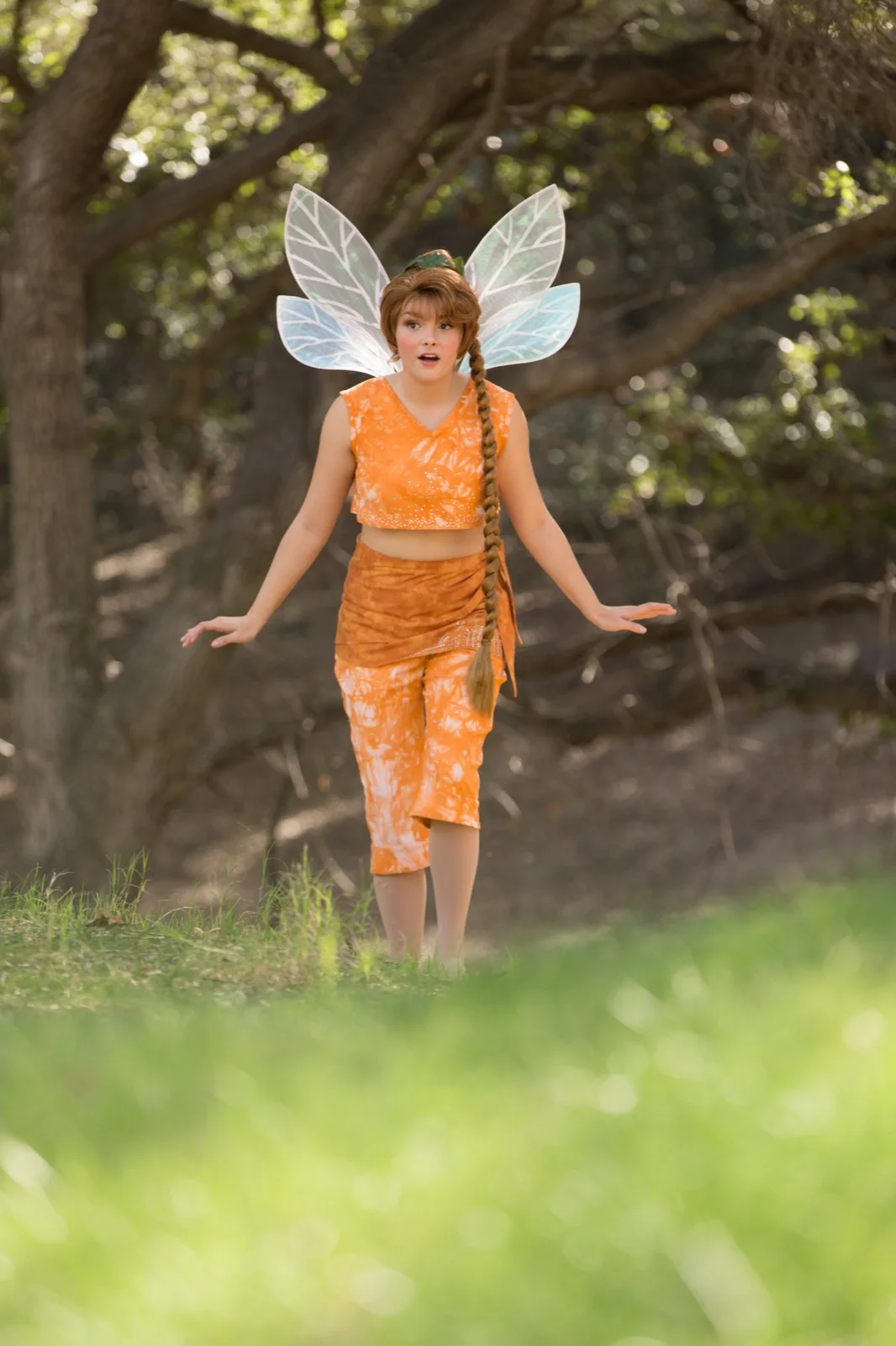 Orange Fairy party character in Austin
